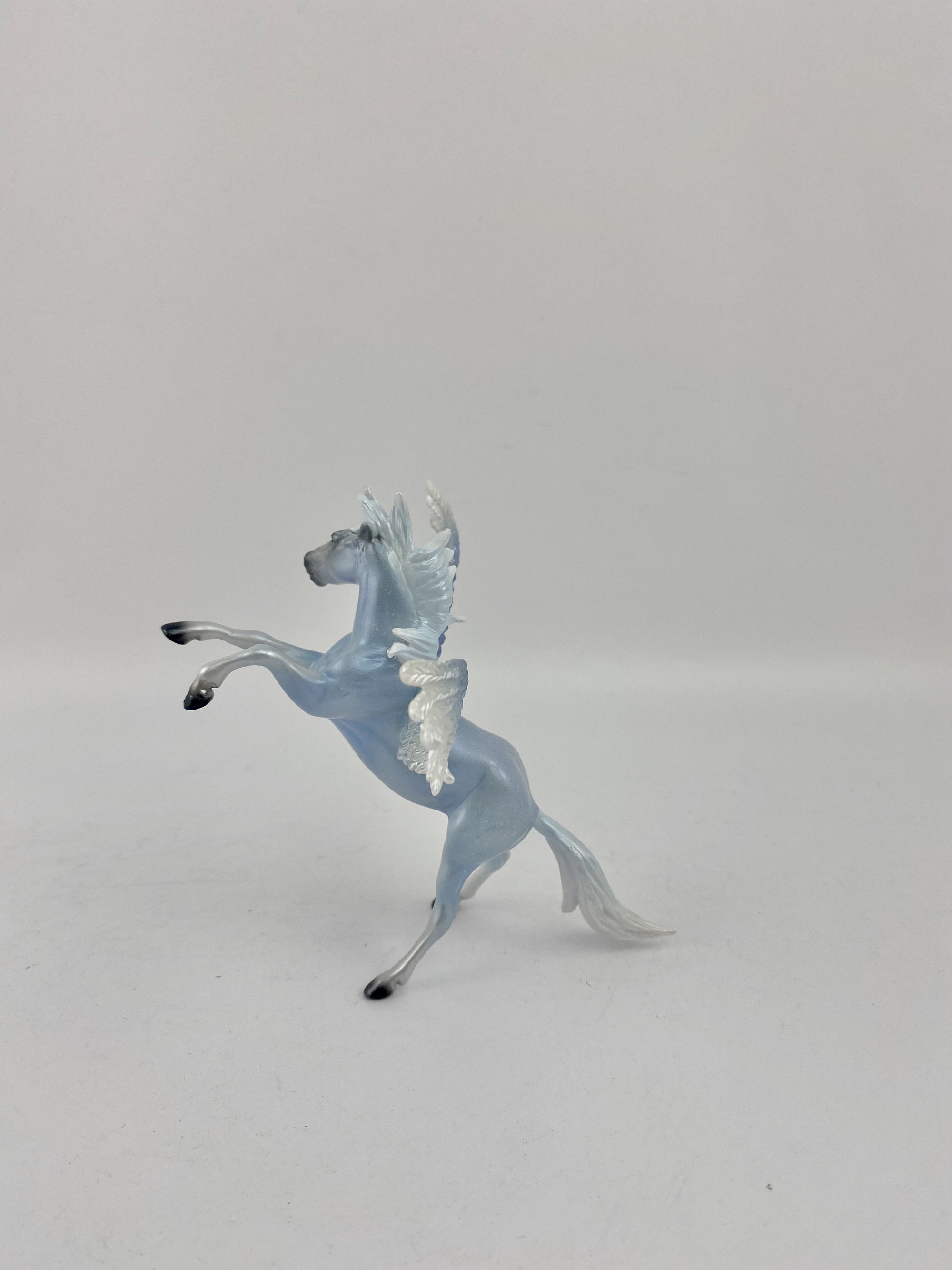 BLUE SKY-REARING CHIP PEGASUS BY AUDREY DIXON